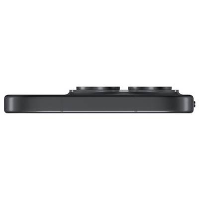 Vue latérale d'un smartphone noir avec deux objectifs de caméra arrière visibles le long du bord supérieur.