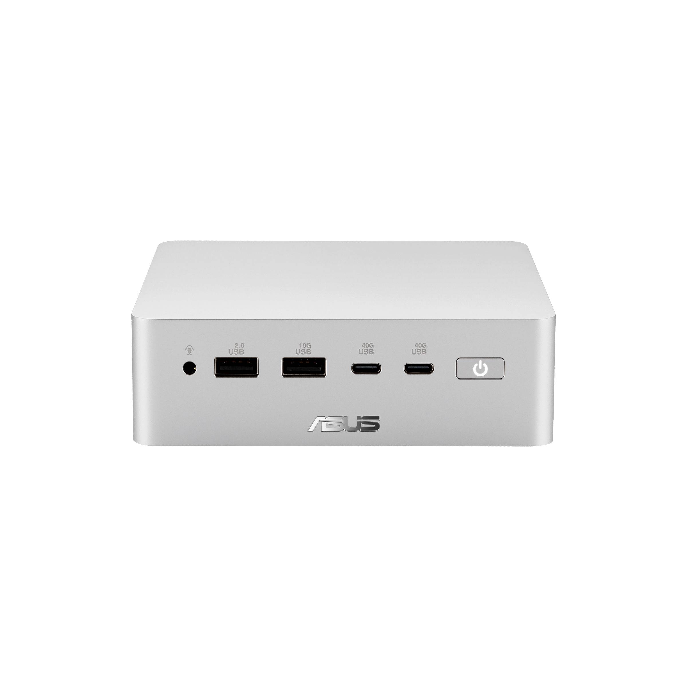 Vue de face d'un mini PC ASUS argenté montrant la prise casque, deux ports USB-A, deux ports USB-C et le bouton d'alimentation.