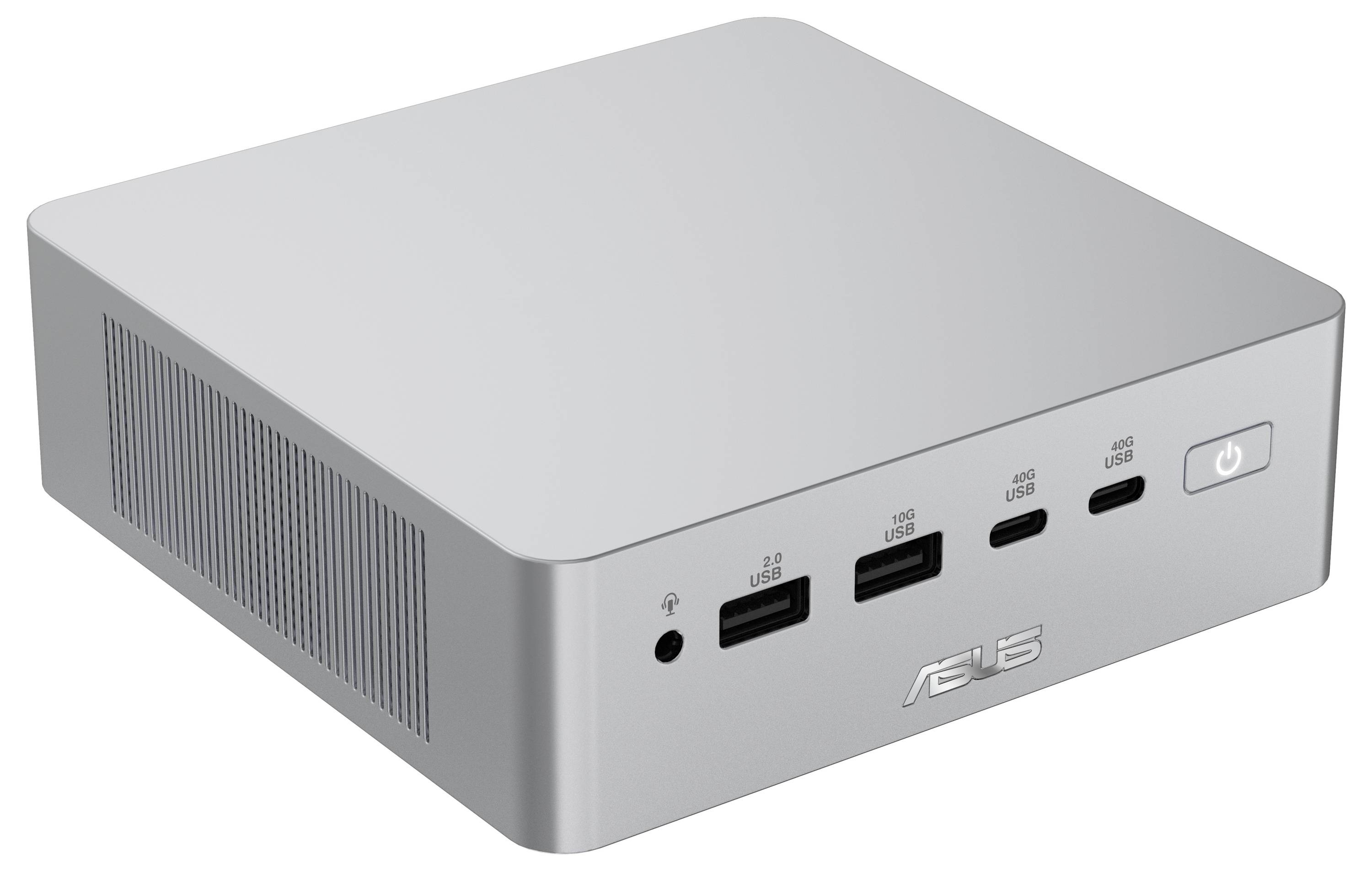 Ordinateur de bureau mini ASUS argenté avec bouton d'alimentation frontal, prise casque et plusieurs ports USB sur le panneau frontal.