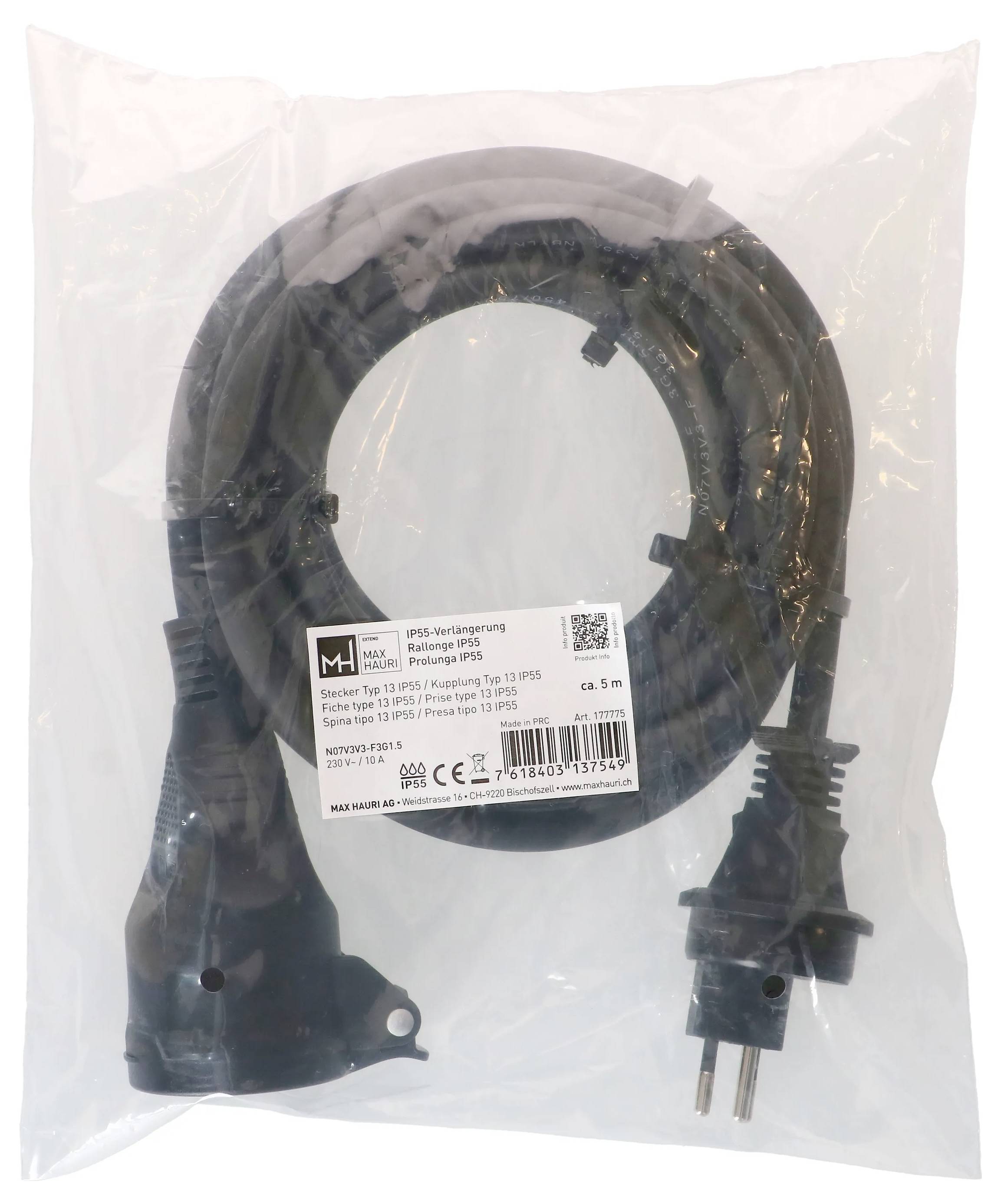 Câble d'alimentation noir emballé avec une fiche à deux broches et une étiquette de produit, enroulé à l'intérieur d'un emballage transparent.