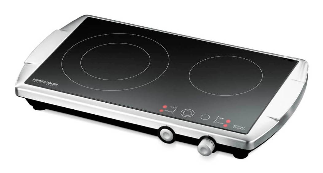 Plaque de cuisson électrique portable à un brûleur avec deux zones de cuisson, dessus en verre noir, boîtier argenté et boutons de commande frontaux.