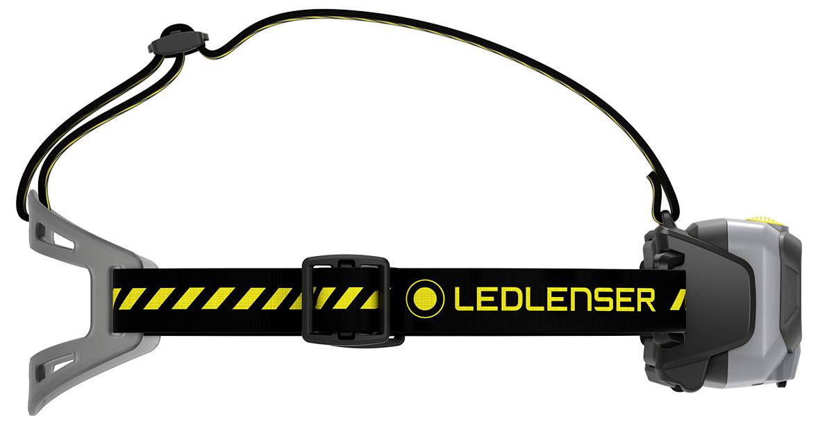 Lampe frontale avec sangle ajustable et unité de batterie avant grise, portant l'étiquette « LEDLENSER », présentée de profil sur un fond blanc.