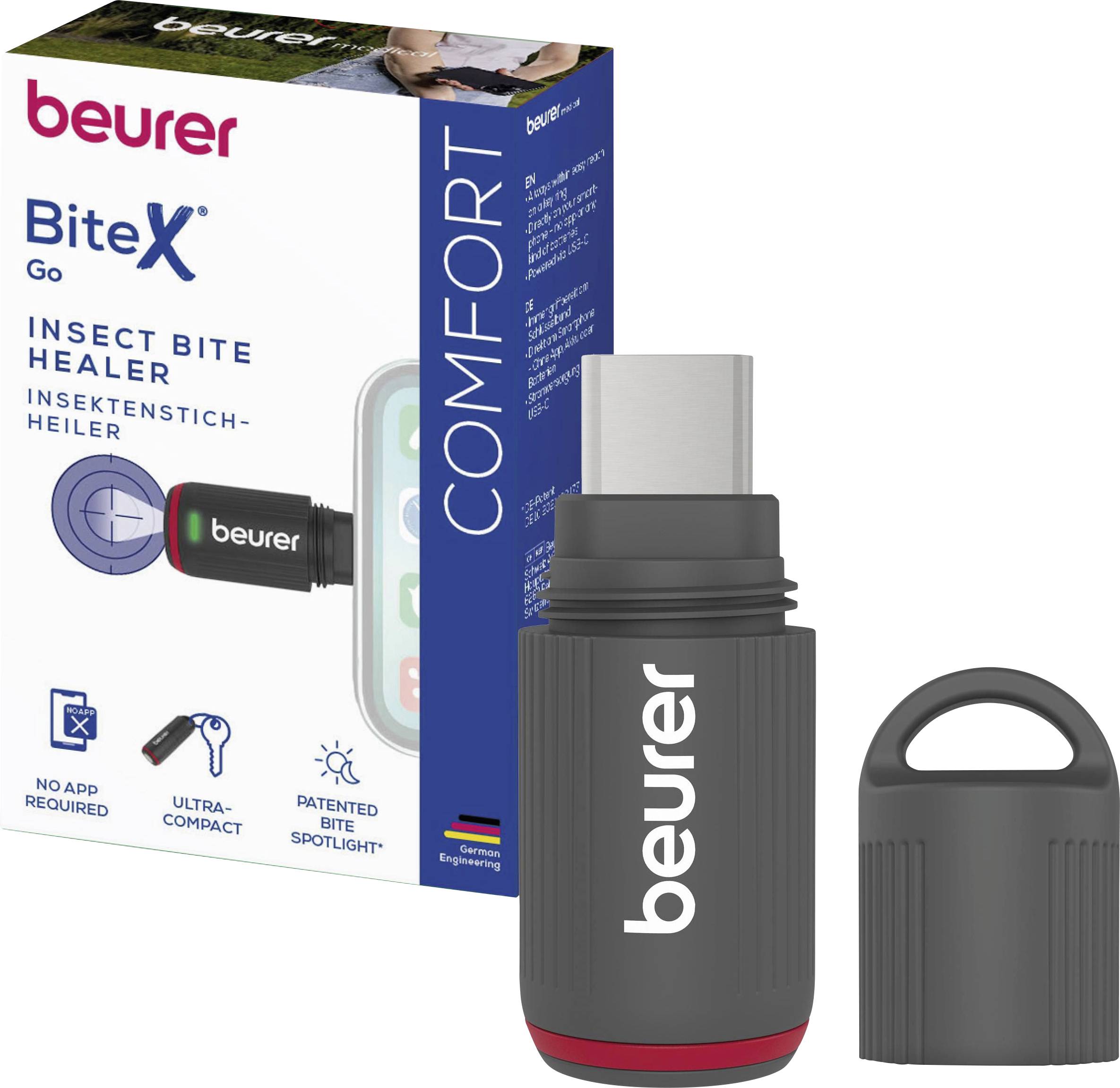 Appareil Beurer BiteX Go pour traiter les piqûres d'insectes avec chargeur USB-C, présenté avec la boîte produit et le capuchon.