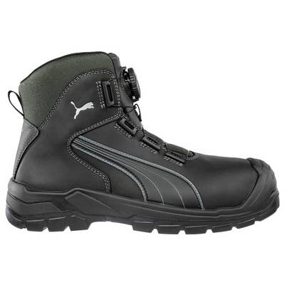 Botte de travail montante Puma noire et verte avec fermeture éclair latérale, fermeture à lacets et semelle crantée robuste sur fond blanc