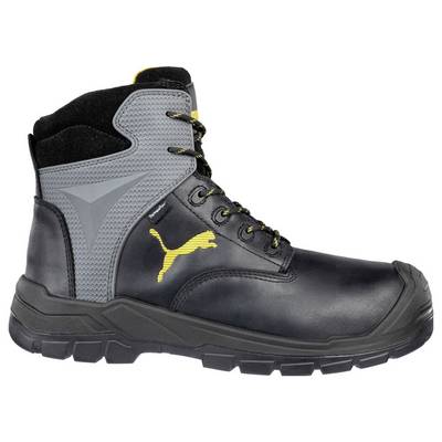 Botte de travail montante noire et grise avec logo Puma jaune, présentée en vue de profil sur fond blanc.