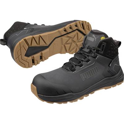 Bottes de travail montantes Black Puma avec semelles crantées tan, présentées de profil et vue de dessous sur fond blanc.