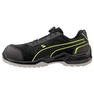 Chaussure de travail athletic noire avec des accents jaune néon et une zone avant renforcée, présentée en vue latérale sur un fond blanc.