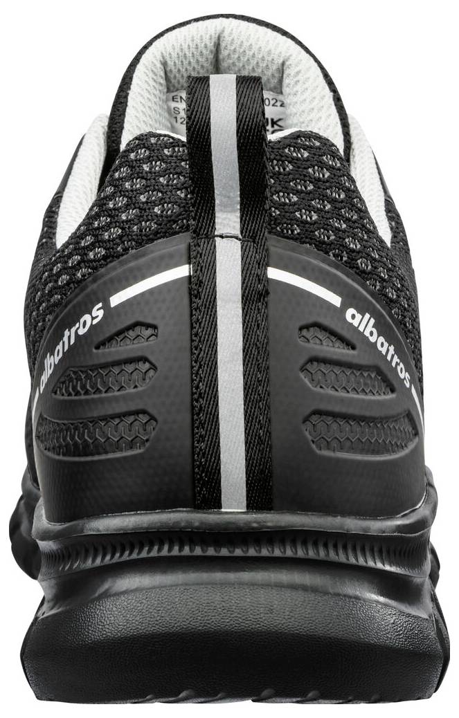 Vue arrière d'une chaussure de sport noire et blanche, montrant le talon, la semelle crantée et la marque « albatros » à l'arrière.