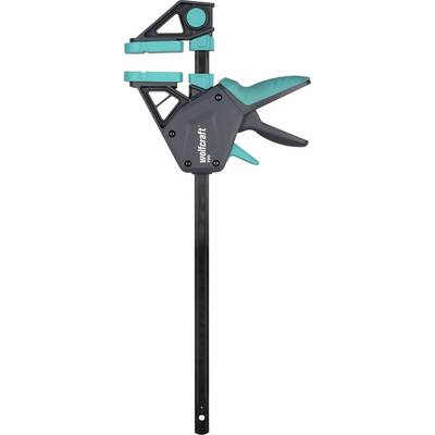 Serre-joint Wolfcraft noir et bleu sarcelle avec mâchoires coulissantes et poignée gâchette sur un rail noir, présenté sur un fond blanc.
