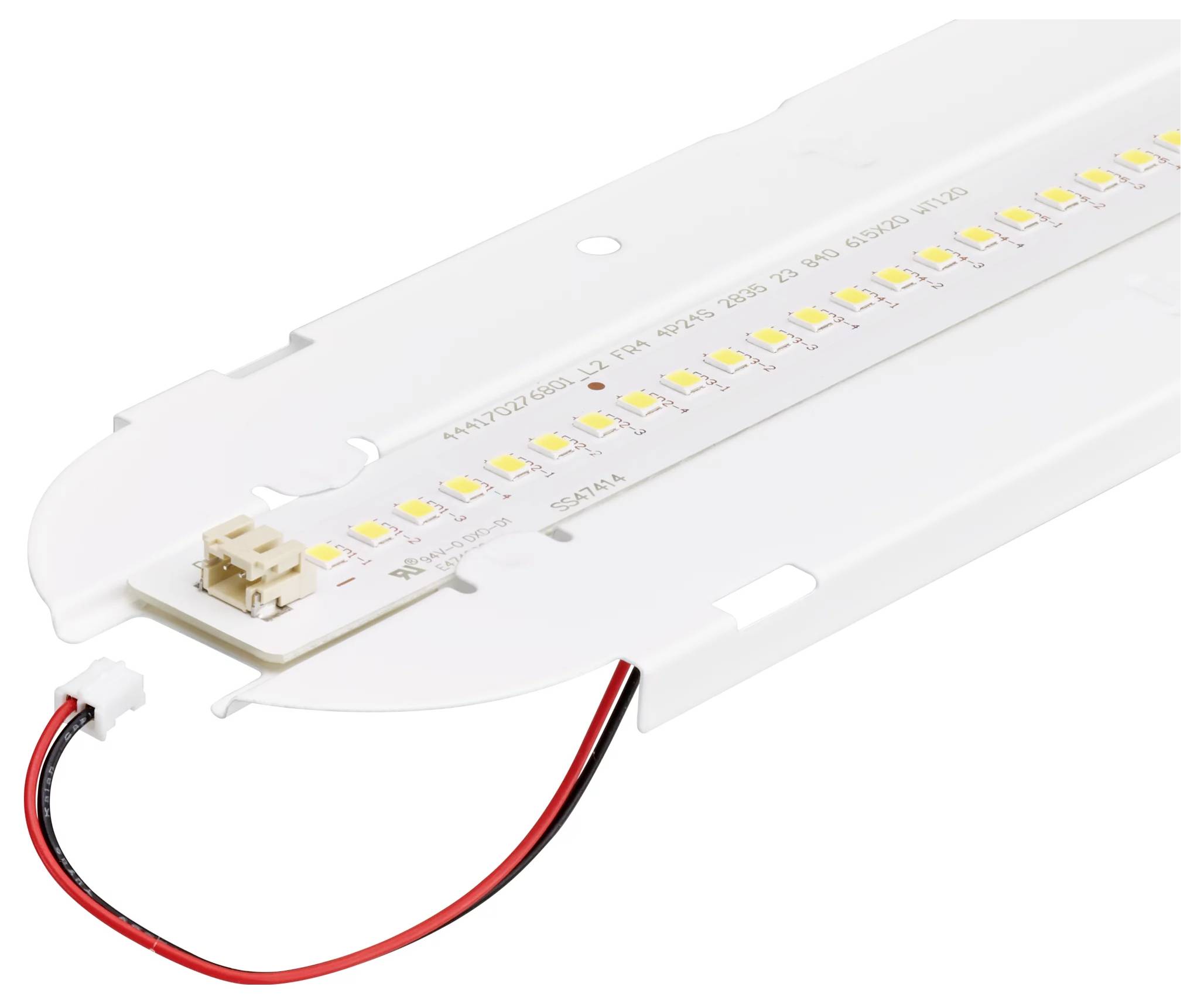 Module de lumière LED blanche avec carte de circuit et fils d'alimentation rouge-noir à l'intérieur d'un boîtier en plastique fin.