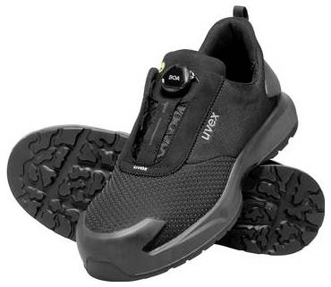 Chaussure de sport noire sans lacets avec semelle crantée robuste, présentée en vue de profil sur fond blanc.