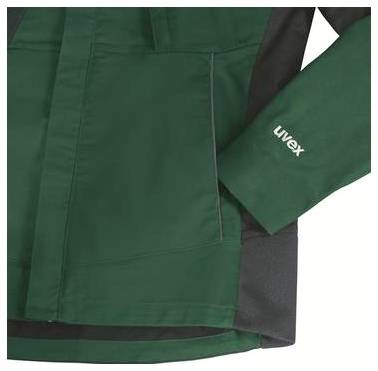 Gros plan d'une manche de veste de travail verte et noire avec le logo « uvex » sur le poignet.