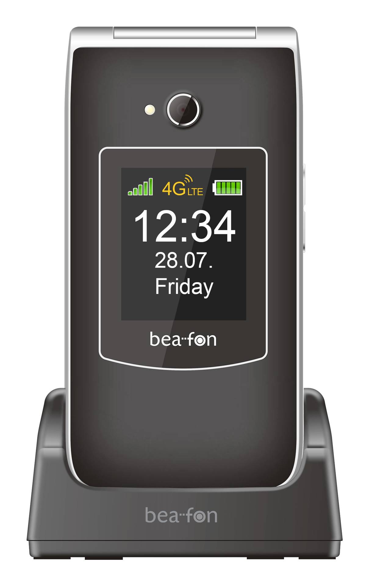 Téléphone mobile à clapet debout dans un socle de charge, affichant un écran avec des barres de signal, 4G LTE, icône de batterie, 12:34, 28.07., et vendredi.