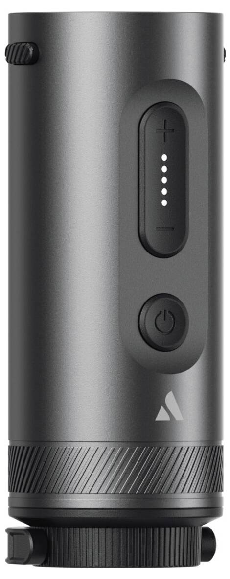 Gros plan d'un haut-parleur portable cylindrique noir ou d'un appareil audio avec des boutons plus/moins de volume, un bouton d'alimentation et une base texturée.