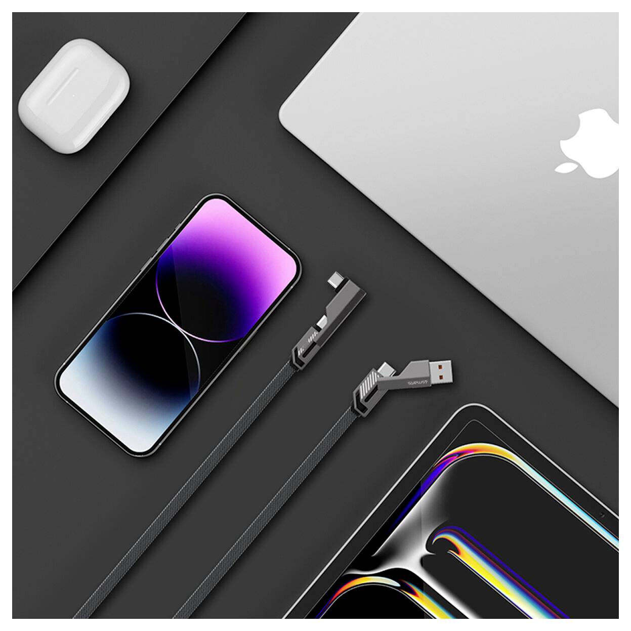 Disposition à plat d'appareils et d'accessoires Apple sur un fond sombre : MacBook, iPhone, étui AirPods et deux câbles de charge