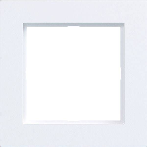 Une plaque de commutateur lumineux carrée blanche et vierge centrée sur un mur gris pâle.