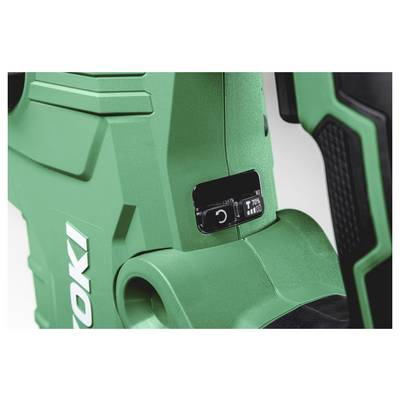 Gros plan d'un outil électrique vert avec un cadran de mode/réglage et un écran, montrant le nom de marque « RYOBI ».