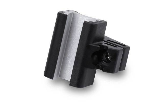 Pince ou support d'accessoire pour appareil photo noir et argenté avec une vis de serrage, présenté sur un fond blanc.