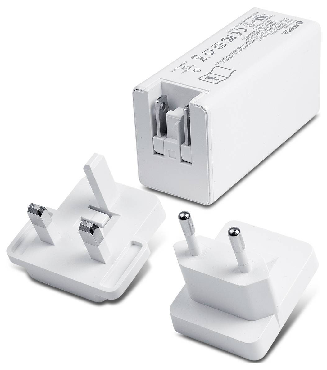 Adaptateur secteur blanc interchangeable avec trois têtes de prise amovibles montré sur un fond uni.