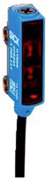 Capteur photoélectrique bleu avec une fenêtre de détection illuminée en rouge et câble attaché, présenté en gros plan.