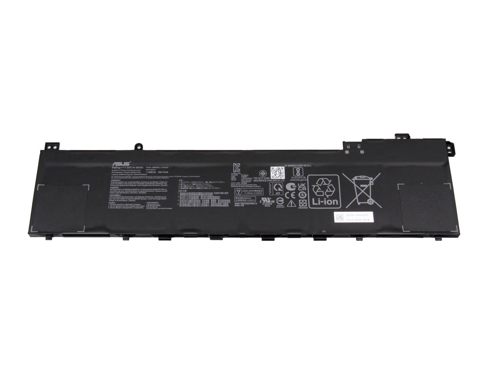 Batterie pour ordinateur portable de couleur noire avec étiquettes de sécurité imprimées et symboles de recyclage sur fond blanc.