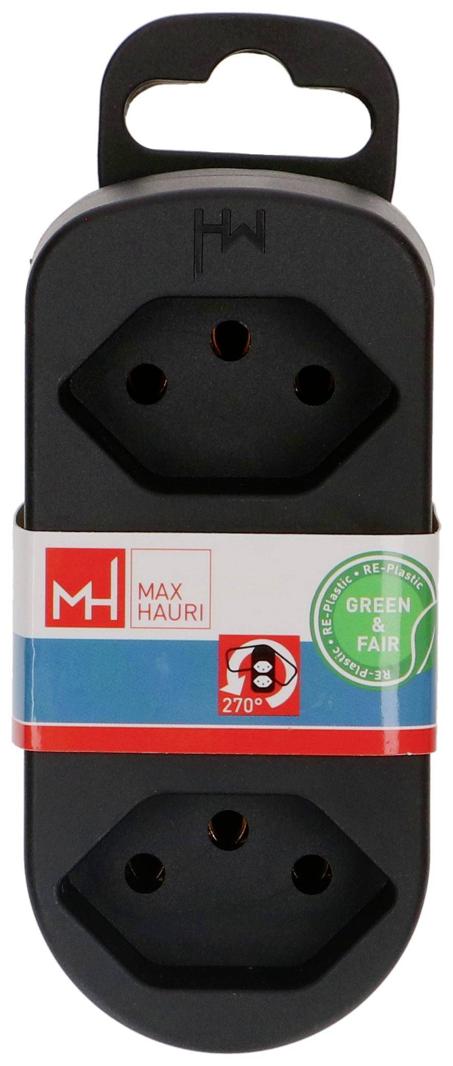 Adaptateur de prise électrique Black Max Hauri avec deux faces de sortie, poignée de transport, et étiquette d'emballage affichant « GREEN FAIR » et rotation de 270°.
