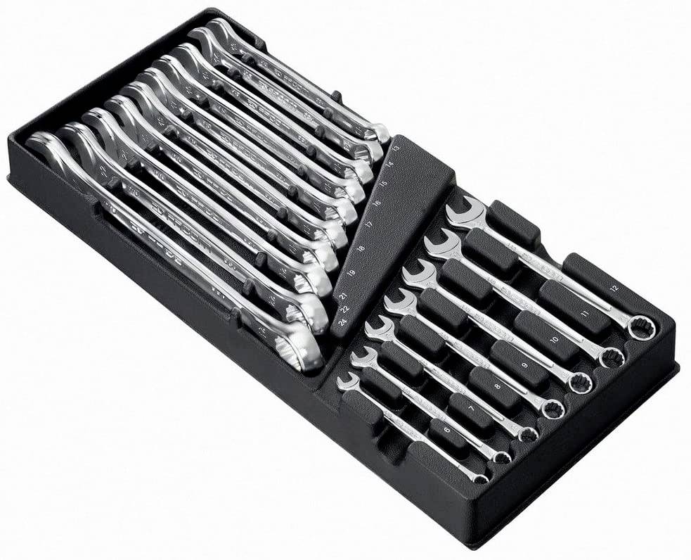 Plateau à outils noir ouvert contenant un ensemble de clés mixtes et de petites clés à cliquet, rangées par taille.