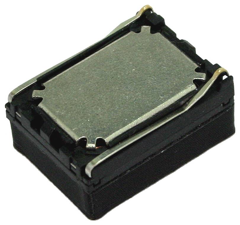 Petit composant électronique noir avec un couvercle métallique supérieur et des clips à ressort, présenté sur un fond blanc.