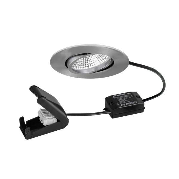 Kit de spot encastré LED avec finition argentée, boîtier de commande noir et connecteur à clip sur fond blanc.