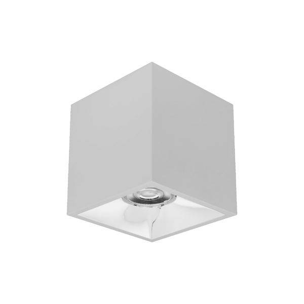 Luminaire de plafond cube blanc avec ampoule encastrée visible en dessous.