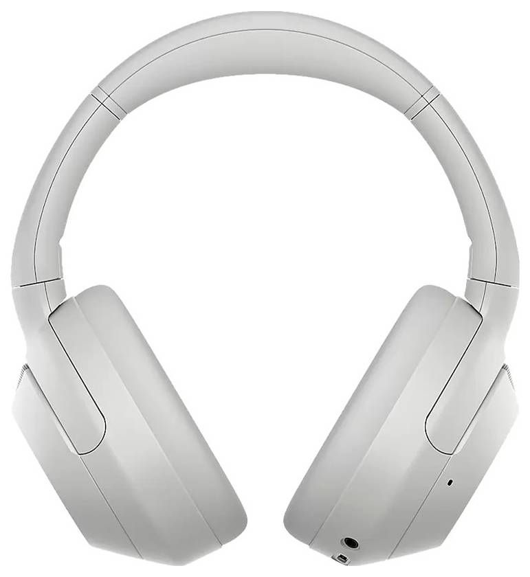 Casque audio sans fil supra-auriculaire argenté avec arceau rembourré et coussinets auriculaires présentés sur un fond blanc.