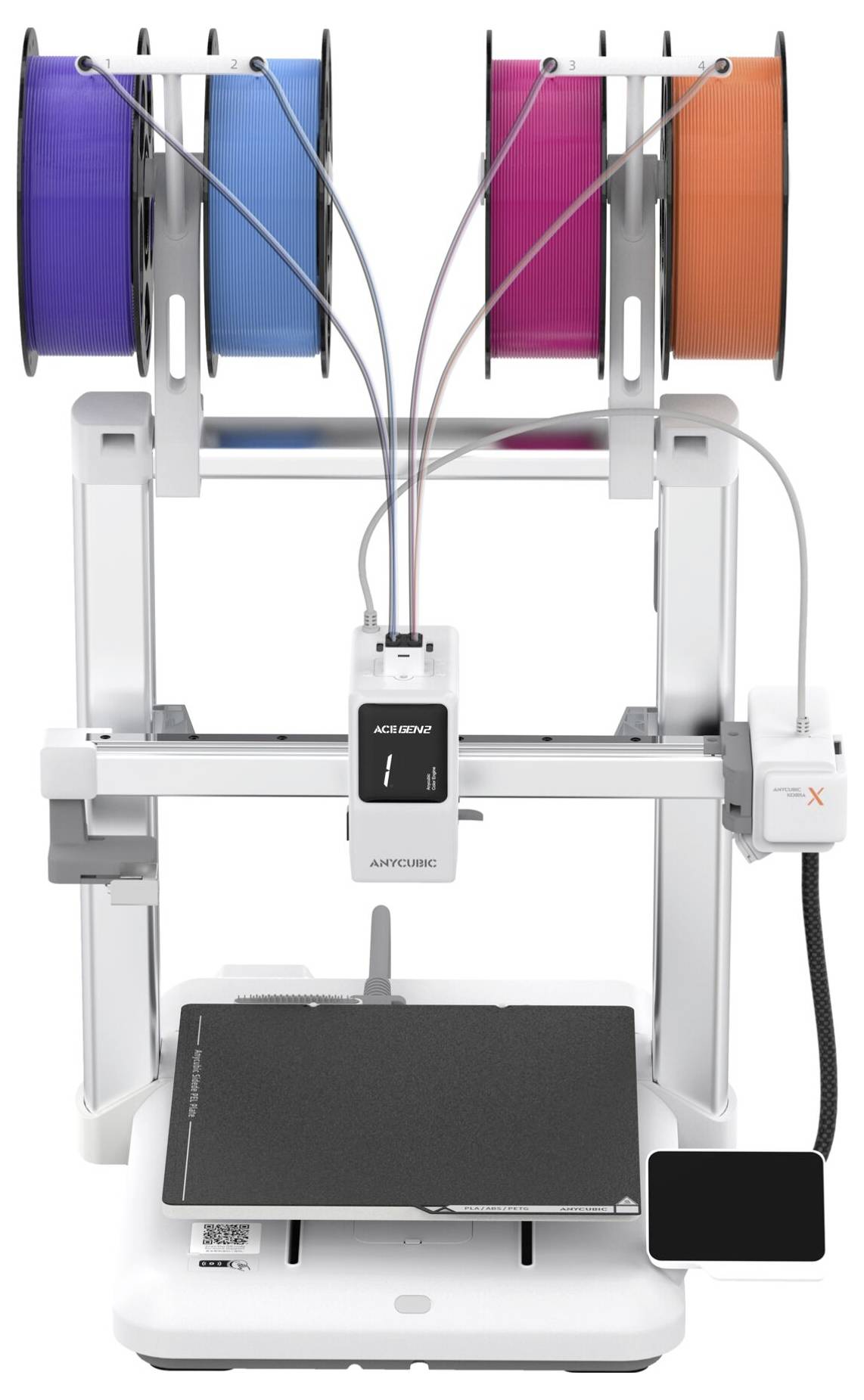 Imprimante 3D avec quatre bobines de filament montées sur le dessus et un plateau d'impression à l'intérieur du cadre