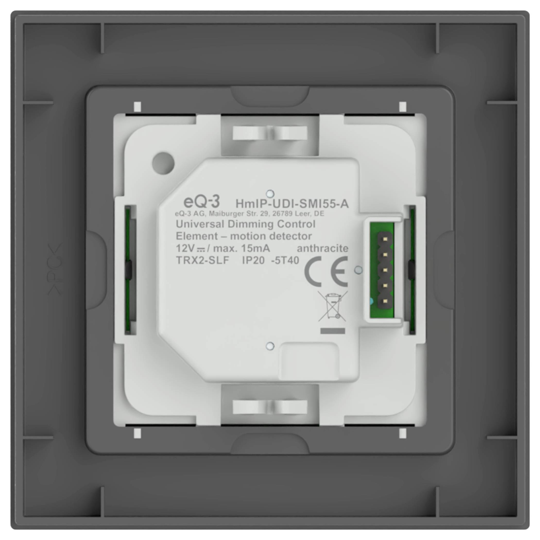 Vue arrière d'un module de contrôle d'éclairage universel eQ-3 Homematic IP monté dans un cadre mural gris, montrant les bornes de connexion et les étiquettes de produit.