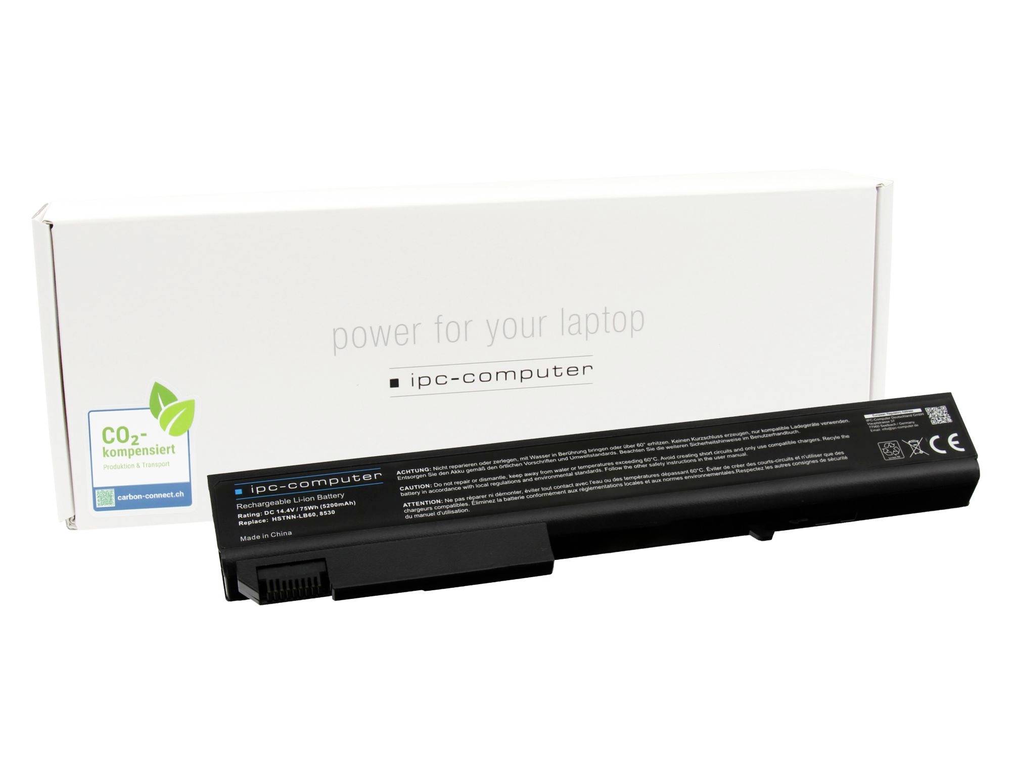 Batterie d'ordinateur portable affichée devant sa boîte d'emballage blanche étiquetée « alimentation pour votre ordinateur portable » et « ipc-computer ».