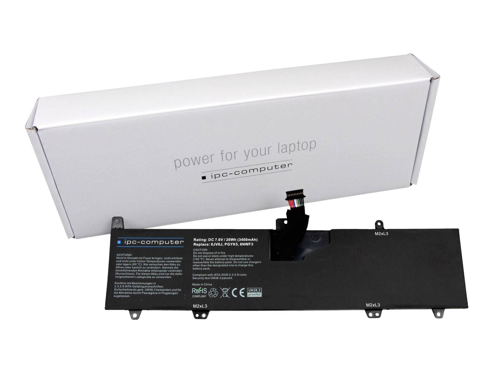Bloc de batterie pour ordinateur portable à côté de sa boîte blanche étiquetée « alimentation pour votre ordinateur portable » et « ipc-computer », montrant les connecteurs et les marquages du modèle sur la batterie noire.