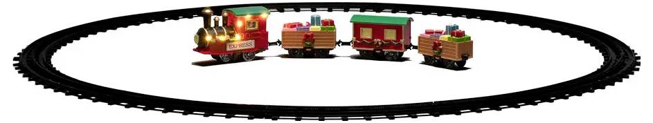Ensemble de train jouet des fêtes sur une piste circulaire noire, avec une locomotive rouge illuminée tirant des wagons décorés transportant des cadeaux empilés.