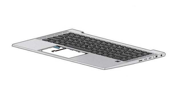 Clavier d'ordinateur portable argenté et repose-paume affichés en angle, avec une grande section manquante exposant les composants internes près du centre.