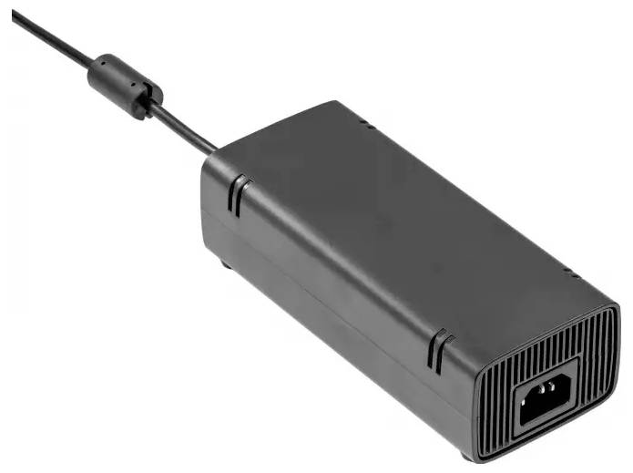 Adaptateur secteur AC noir de forme rectangulaire avec cordon attaché et connecteur de prise.