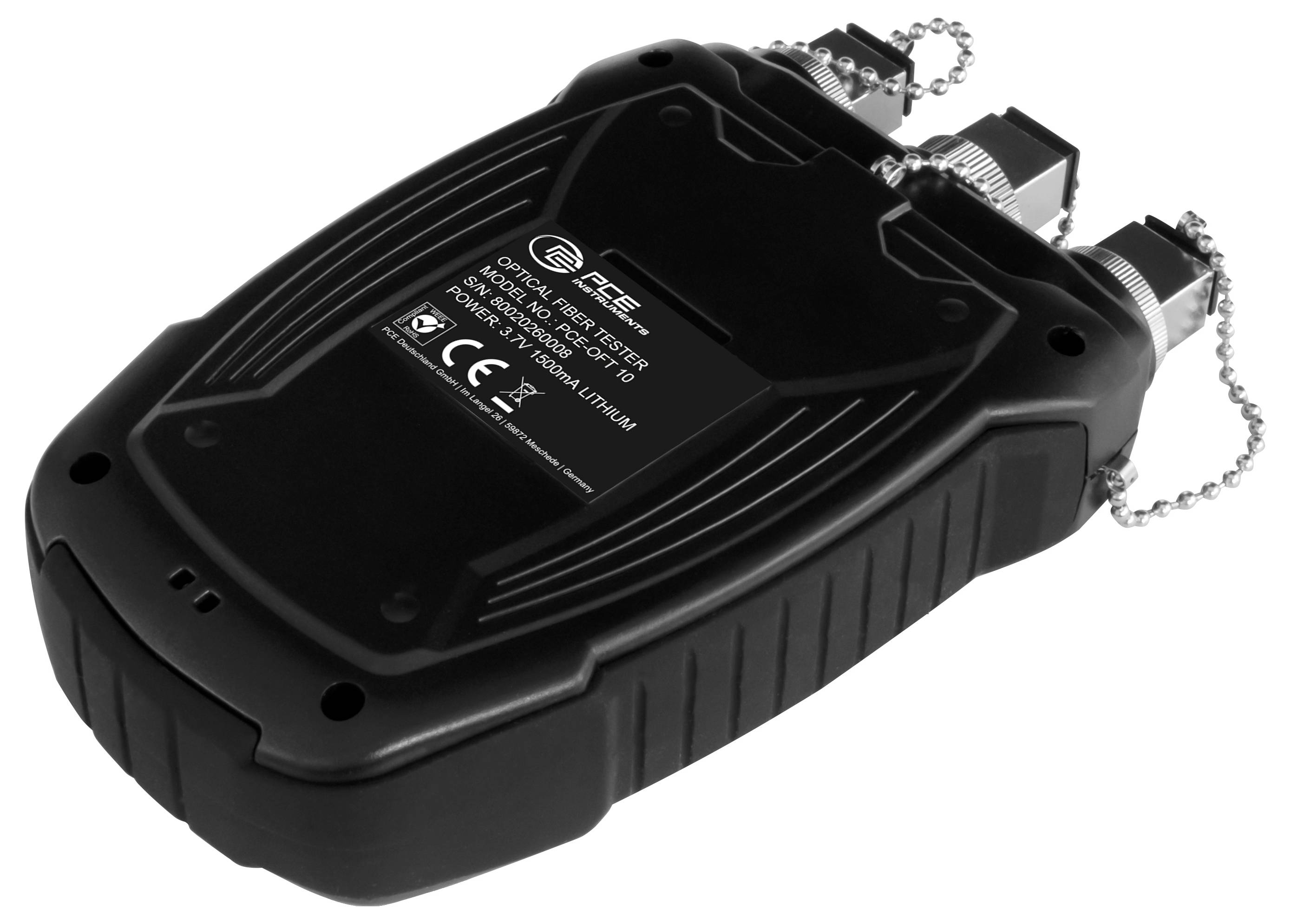 Testeur électronique portatif noir avec connecteurs à bouchon chaîné et étiquette, présenté sur fond blanc.