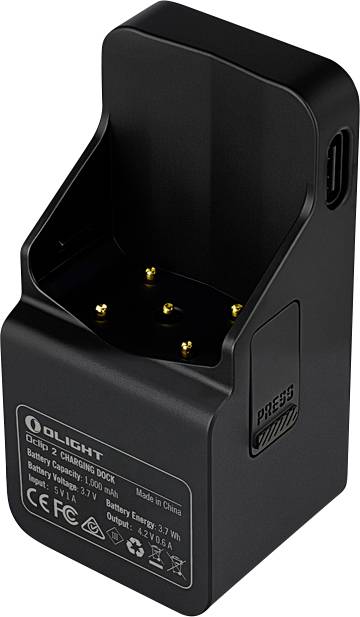 Socle de charge double Olight noir avec cinq broches de contact dorées et port USB latéral, présenté de l'avant-gauche.