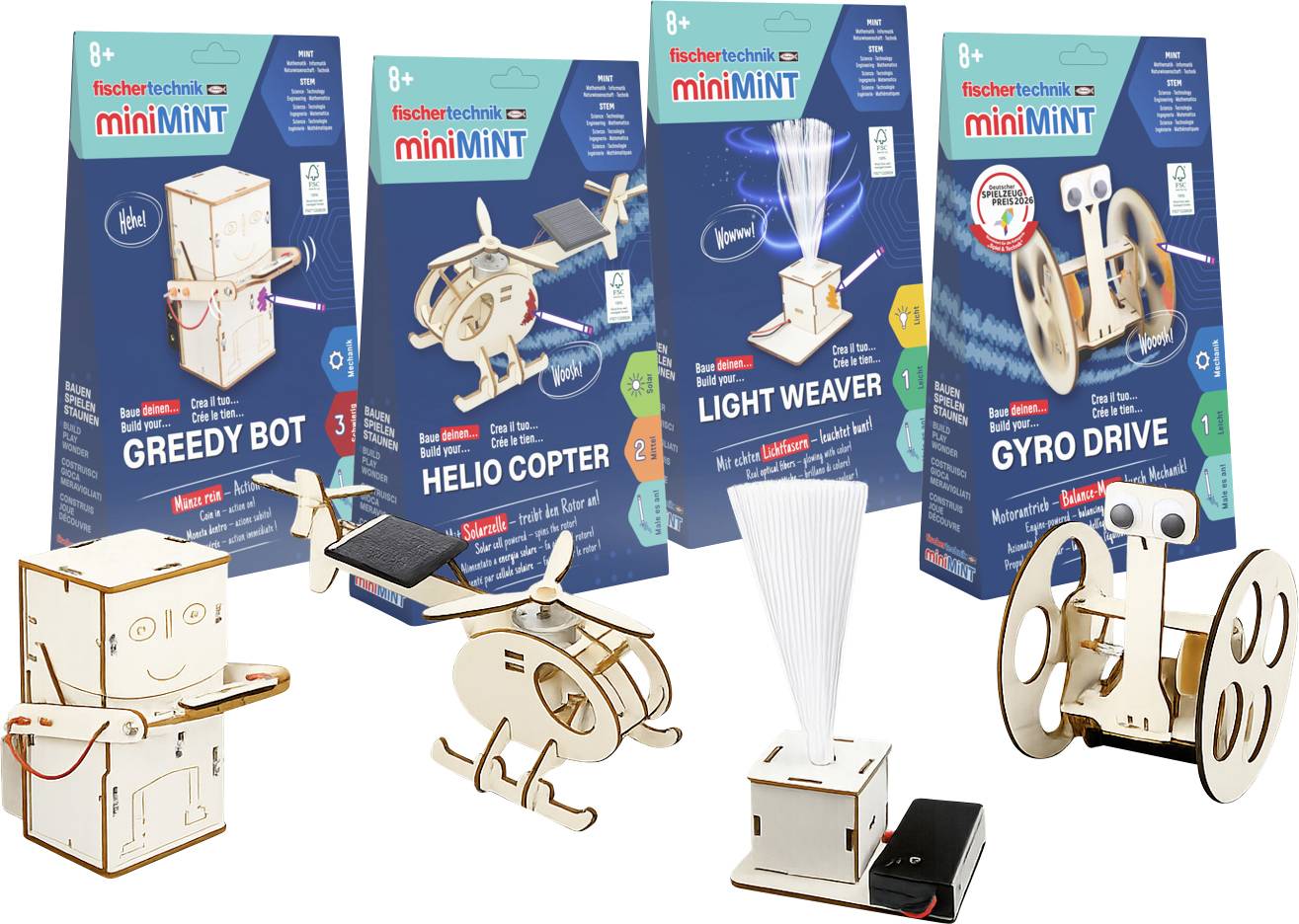 Quatre kits de robotique Fischertechnik miniMINT sont présentés avec des modèles assemblés : Greedy Bot, Helio Copter, Light Weaver et Gyro Drive.