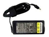 Adaptateur d'alimentation pour ordinateur portable noir avec câble de recharge enroulé et prise