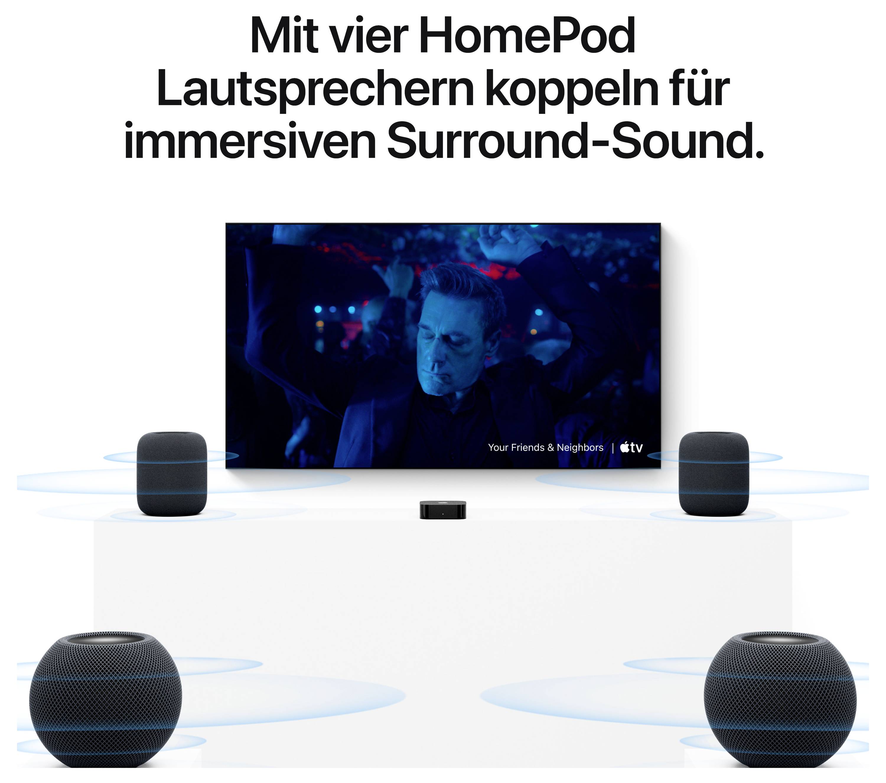 Publicité pour HomePod Surround Sound : Quatre haut-parleurs autour d'un téléviseur pour un son immersif.