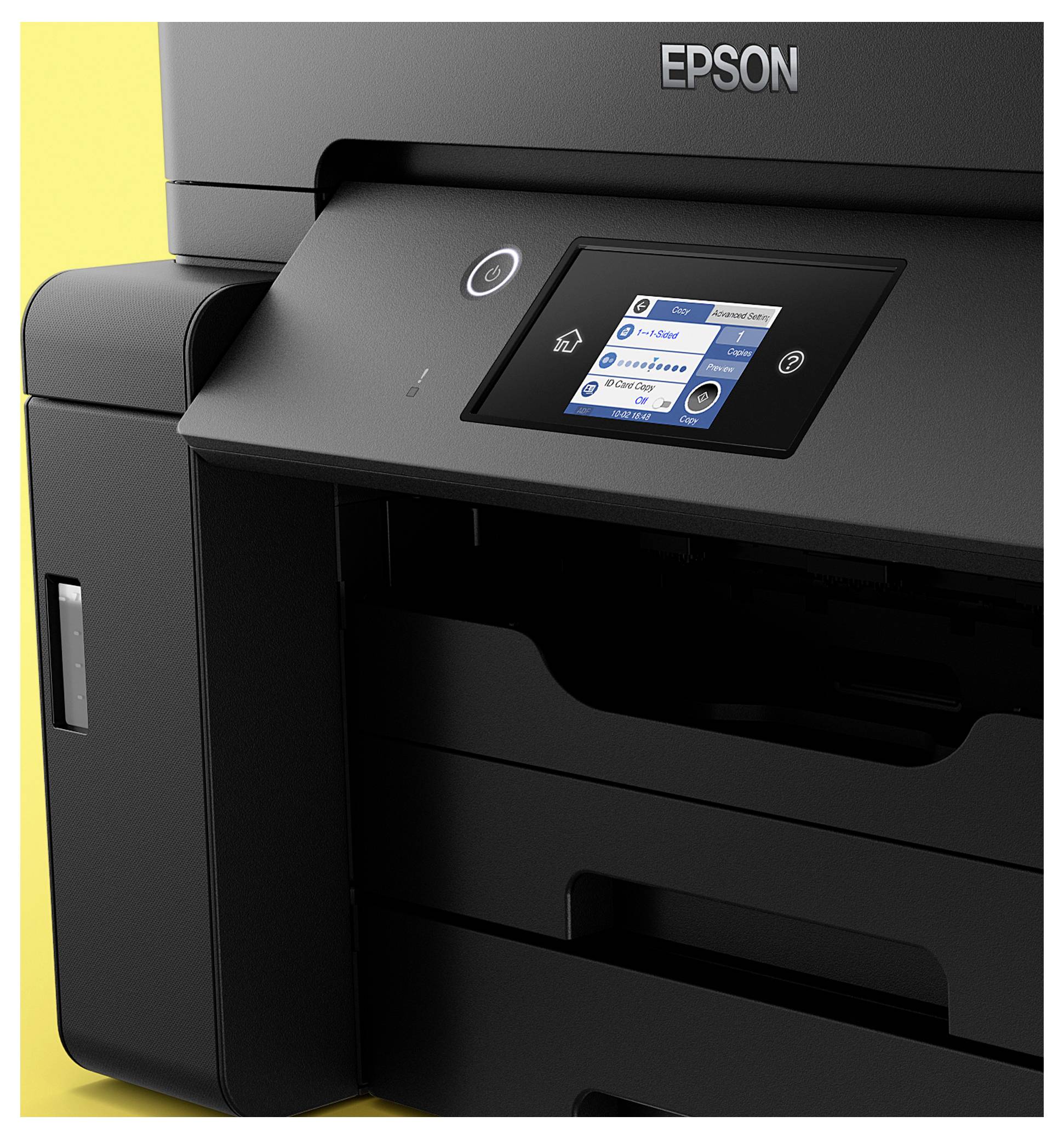 Imprimante Epson noire avec un petit écran tactile couleur de commande sur la face avant, présentée sur un fond jaune.