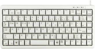 Un clavier blanc QWERTZ avec des touches fonctionnelles comme "Inser", "Début" et une rangée de chiffres.