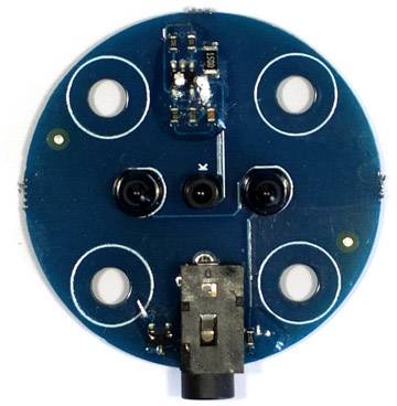 Composant électronique bleu, rond, doté de quatre ouvertures et de plusieurs capteurs noirs. Il possède un connecteur sur sa face inférieure.