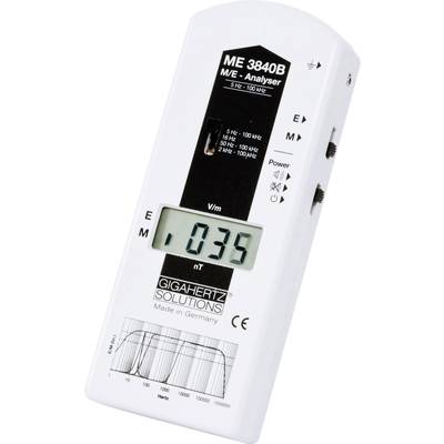 Appareil de mesure électromagnétique avec affichage de '0,35 V/m' sur un boîtier blanc. Marquage de Gigahertz Solutions.