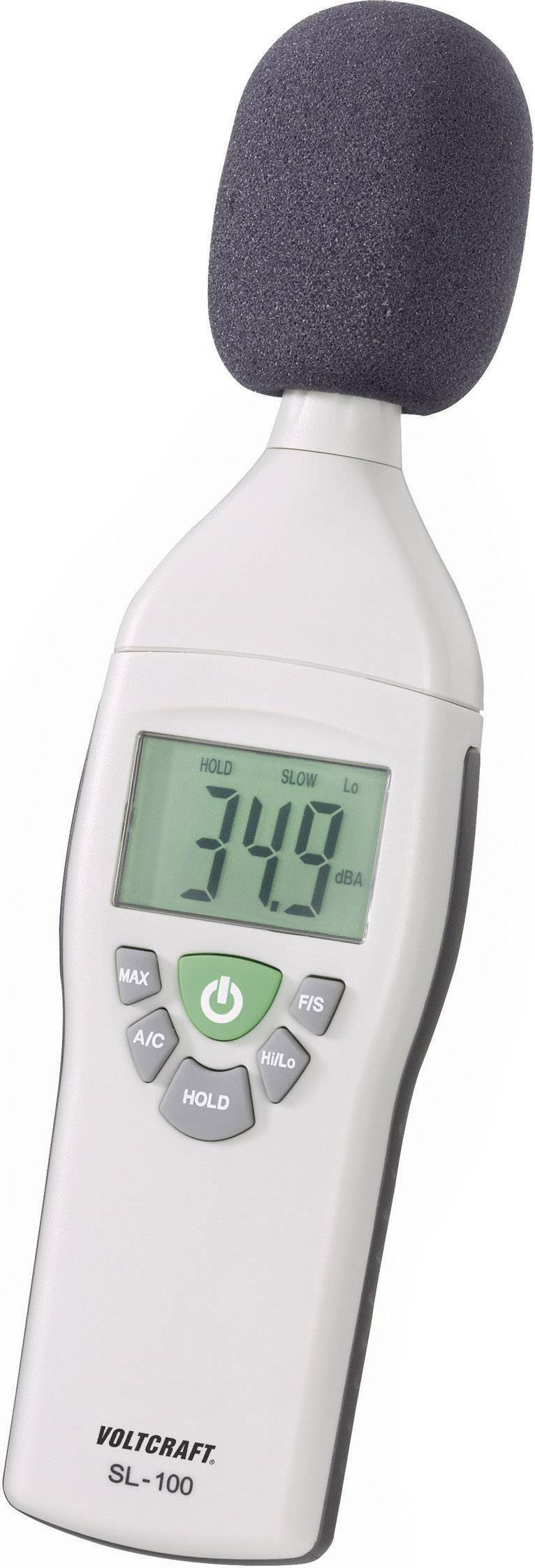 Un sonomètre avec affichage numérique indique 34,9 dB. L'appareil possède un microphone en haut et des touches de commande en dessous.