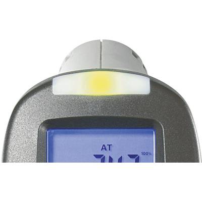 Un thermomètre numérique affiche une mesure de 74,7 °C. Une lumière jaune s'allume, probablement comme indicateur.