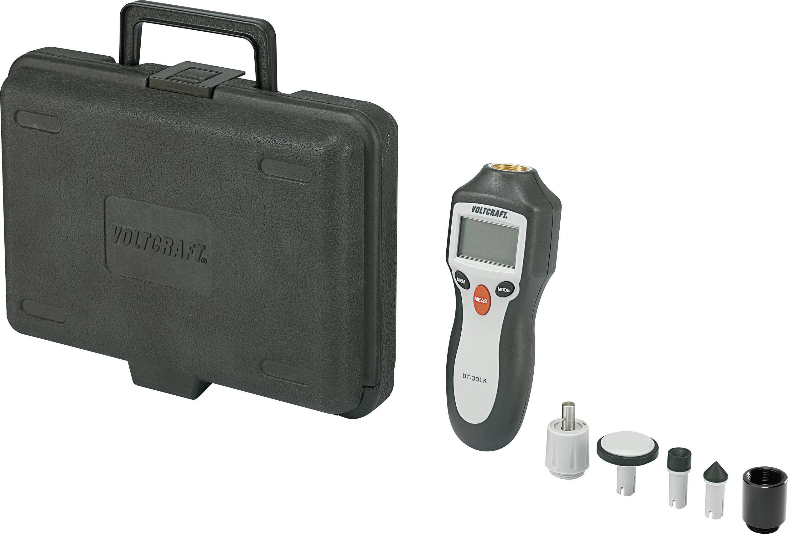 Un tachymètre numérique avec affichage LCD, accompagné de plusieurs accessoires et d'un coffret de transport noir.